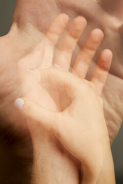 Couple hold each other hands.
