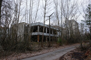 Abandoned building in Pripyat. Old buildings in the Chernobyl resettlement zone.
