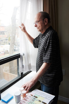 Portrait of an Elderly Man Looing Out of Window