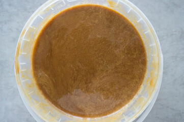 Forest honey mixed with resin of coniferous trees in a bowl