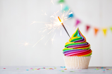 Rainbow cupcake with sparkler