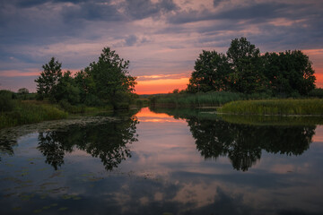 Obraz premium Sunset in summertime on the river