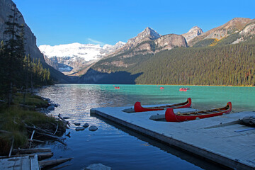 Red Canoes for recreation at Moraine lake in Alberta, Canada
