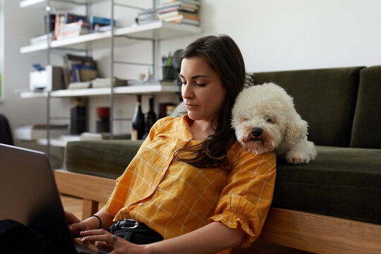 Young woman working from home.