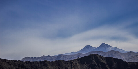 Mountain silhouette from a base camp in the andes