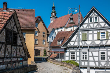 Old historical buildings and a road made of paving stones