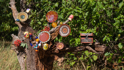 Multi colored traditional ceramic items as handmade pots, plates and clay beads  of Slavic culture...