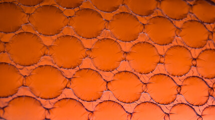 a red sheet of plastic bubble wrap