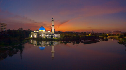 Fototapeta na wymiar A sunrise scene of local muslim mosque taken via drone during a lockdown from Kuala Lumpur, Malaysia.