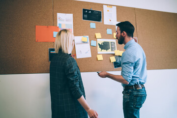 Coworkers sharing with ideas in office