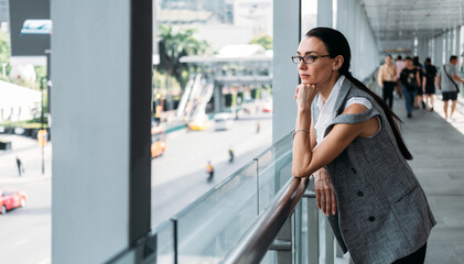 Business woman looking at city stock photo