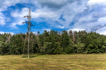 high-voltage power lines. electricity distribution station. high voltage electric transmission tower. Alternative energy