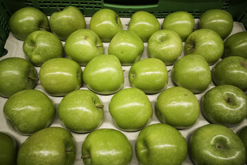 Green apples in greengrocer