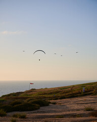 paraglider over the sea