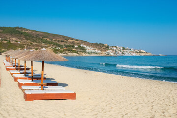 Fototapeta na wymiar Empty tourist beach on Greek Island because of coronavirus in Ikaria