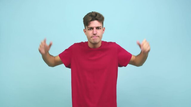 Young caucasian student man angry and upset, very tense, screaming furious, negative and crazy