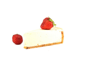 Slice of cheesecake and strawberries isolated on white background.