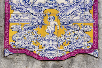 panels of polychrome azulejos on the walls of a beautiful ruined house in Setubal