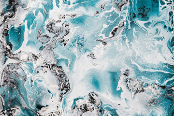 The texture is white, blue and dark.