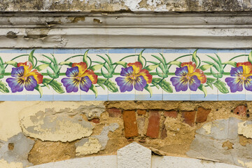 azulejos frieze on ruined houses in setubal