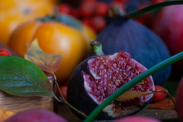 Ripe autumh figs and persimmons