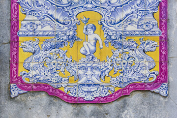 panels of polychrome azulejos on the walls of a beautiful ruined house in Setubal