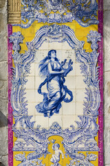 Fototapeta na wymiar panels of polychrome azulejos on the walls of a beautiful ruined house in Setubal