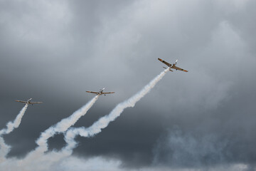 small retro aircrafts in blue sky