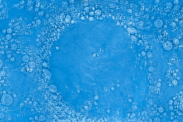 The texture of the water is blue with bubbles.