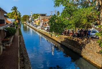 Fototapeta premium A view along the banks of the Dutch Canal in Negombo, Sri Lanka