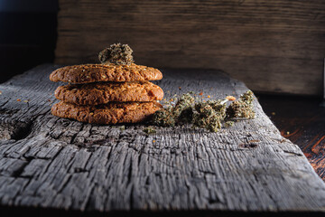biscuits with hemp on an old wooden background close-up. rustic. Horizontal orientation.