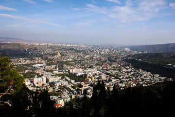 Fototapeta na wymiar Panorama of the city in the valley