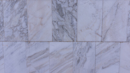 background of white marble tiles