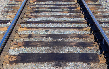 Close-up of old rusty steel rails. The view from the top