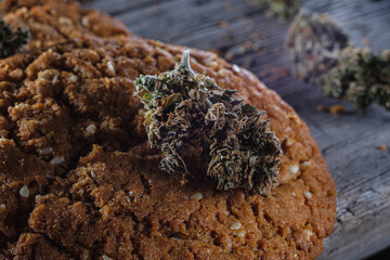 biscuits with hemp on an old wooden background close-up. rustic. Horizontal orientation.