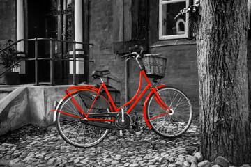 Red bike on black/white back