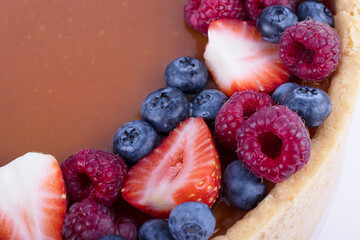 Homemade strawberry and blueberry cheesecake for dessert