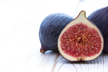 Raw halved fig fruit macro close up.