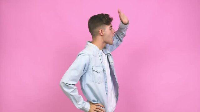 Young student teenager man confused, feels doubtful and unsure