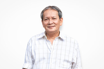 Portrait of smiling asian senior man standing in front of white background with self confident manner. Closeup face of elder smile with gray hair.