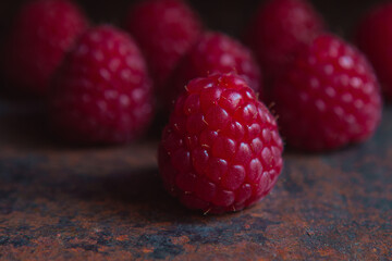 Summer berry background, raspberry berries close up