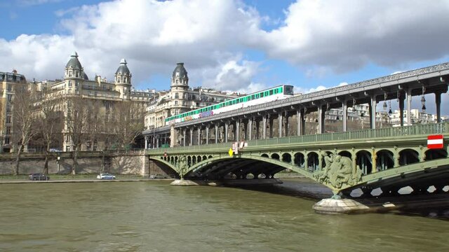 Metro traffic on Pont Bir-Hakeim (Passy viaduc) - Paris, France. Train move from Passy station to Bir-hakeim station.