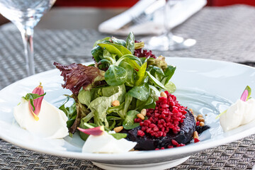 Lettuce, rice and beetroot salad on a plate