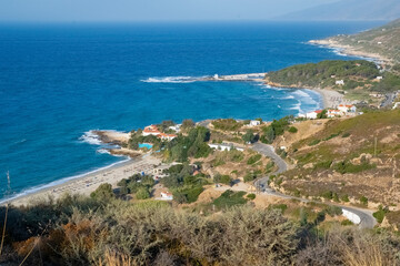 Fototapeta na wymiar Aerial view of Ikaria coast with Livadi, Mesakti and Gialiskari 