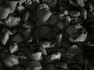 charcoal for barbecue in the grill, coal factory black and white photo
