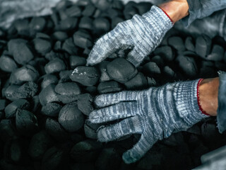 Coal mining - Man's hands in gloves holding natural black coal for back. Picture idea about coal...