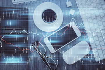 Multi exposure of forex graph hologram over desktop with phone. Top view. Mobile trade platform concept.