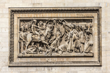 Detail of Arc de Triomphe de l'Etoile - one of most famous monuments in Paris. Arc de Triomphe (1836) built by order of Napoleon to commemorate victories of his Army. Paris, France.