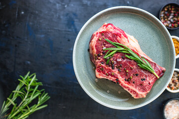 fresh steak rib eye meat beef juicy on the table serving portion size top view copy space for text