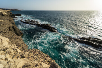 Beautiful cliffs of limestone carved by wind and winter storms in Ajuy village on the Atlantic coast. Fuerteventura. Canary Islands. Spain.